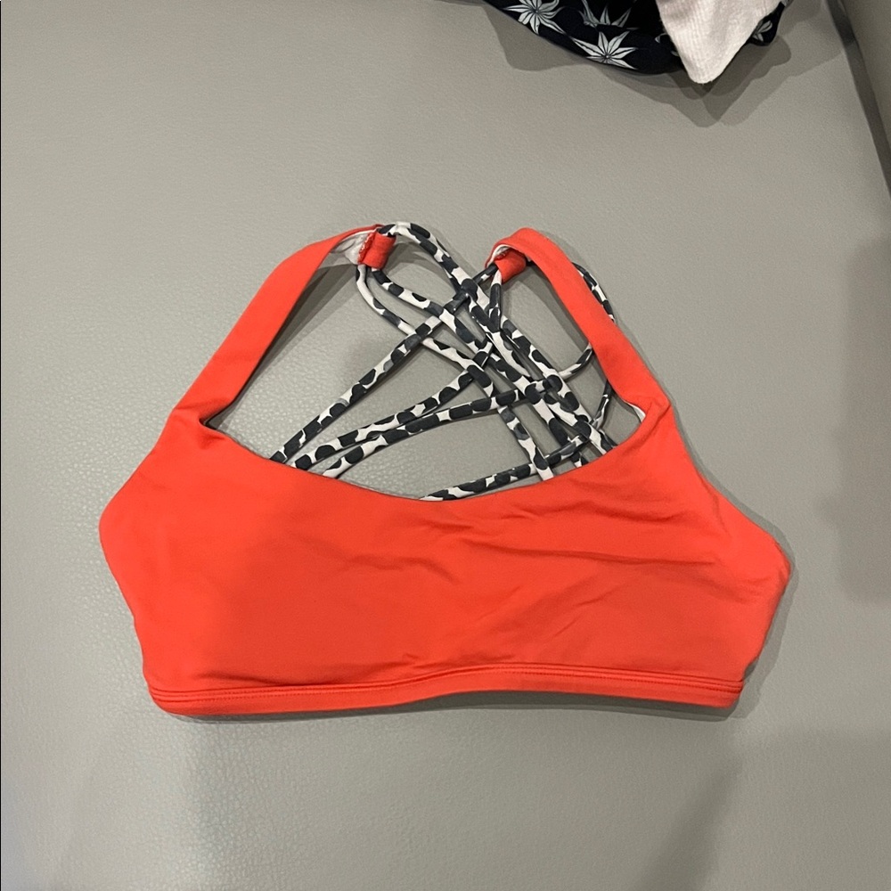 Women's Lululemon Strappy Coral Sports Bra, size 4
